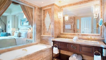Separate tub and shower, rainfall showerhead, hair dryer, bathrobes