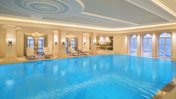 Indoor pool, open 6:00 AM to 10:00 PM, lifeguards on site