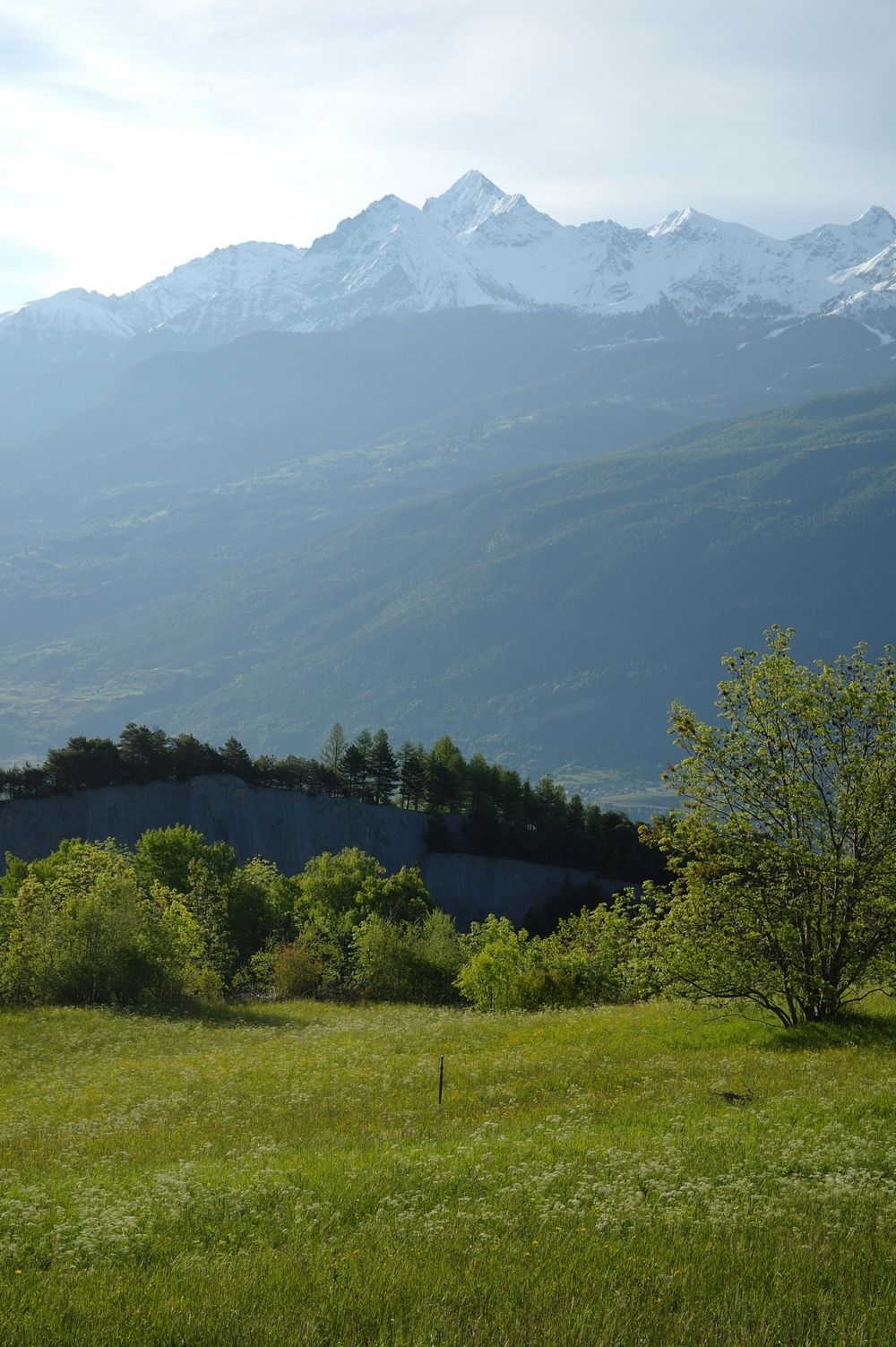 A mountainous landscape with a clear sky.