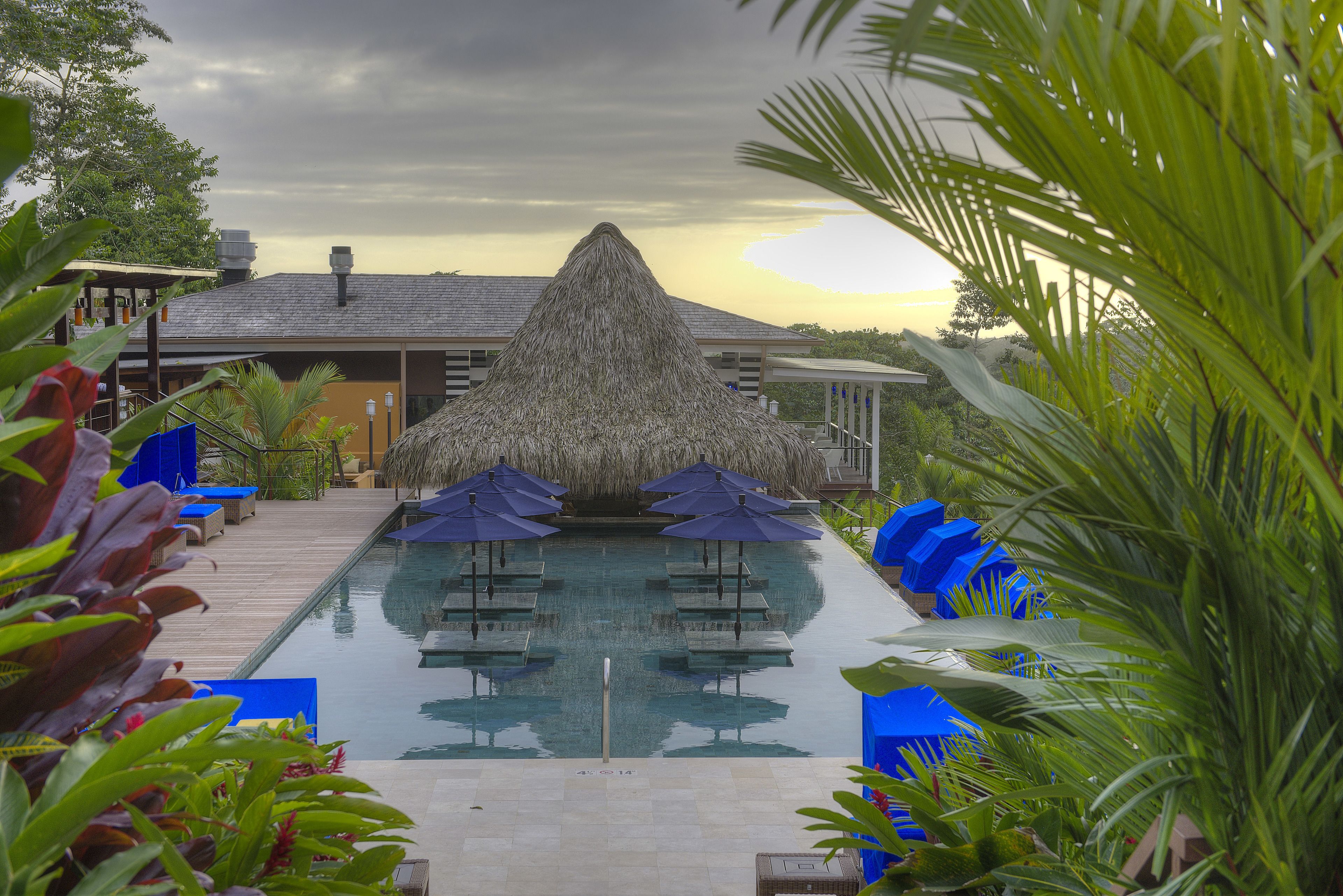 2 outdoor pools, open 8:00 AM to 10:00 PM, pool umbrellas, sun loungers