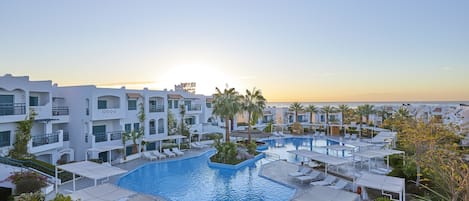 Outdoor pool, pool umbrellas, sun loungers