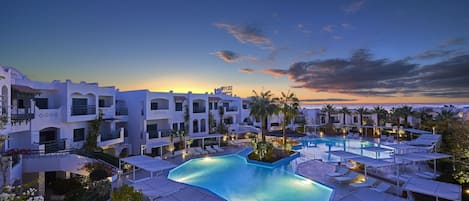 Outdoor pool, pool umbrellas, sun loungers