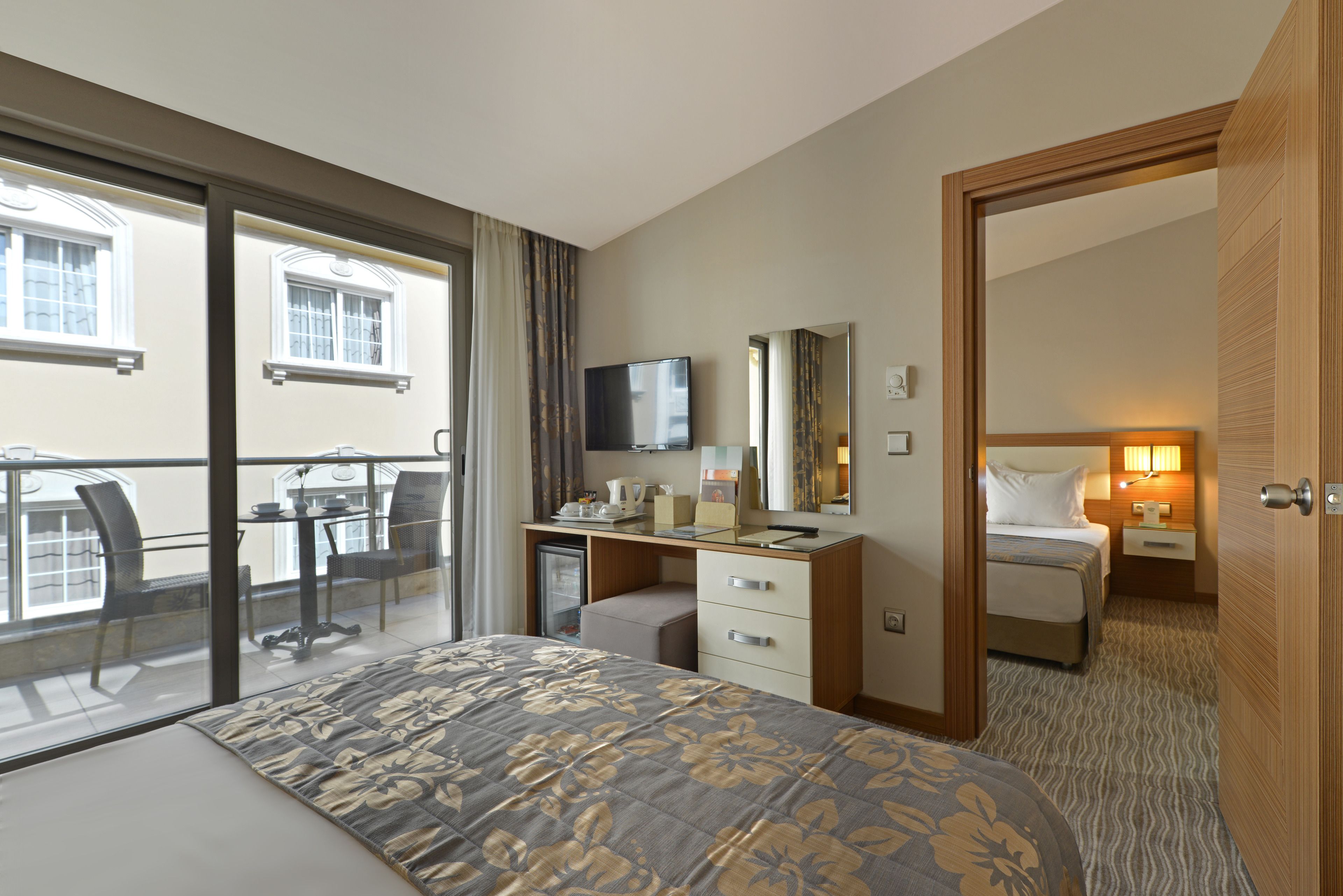 family suite, multiple bedrooms, balcony, city view | premium bedding, minibar, in-room safe, soundproofing