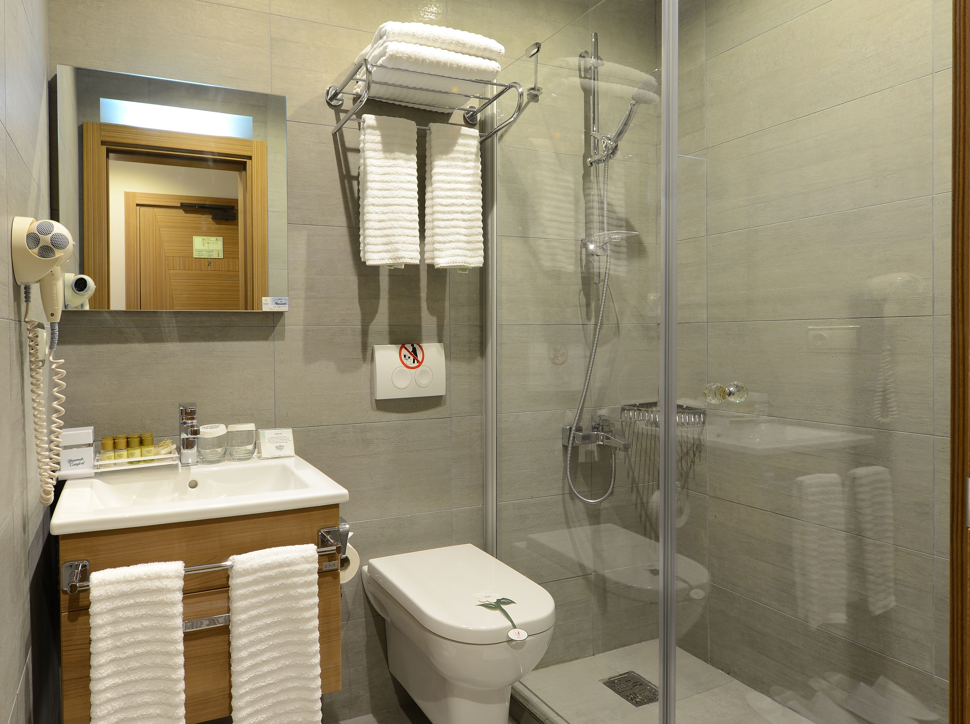 shower, free toiletries, hair dryer, towels