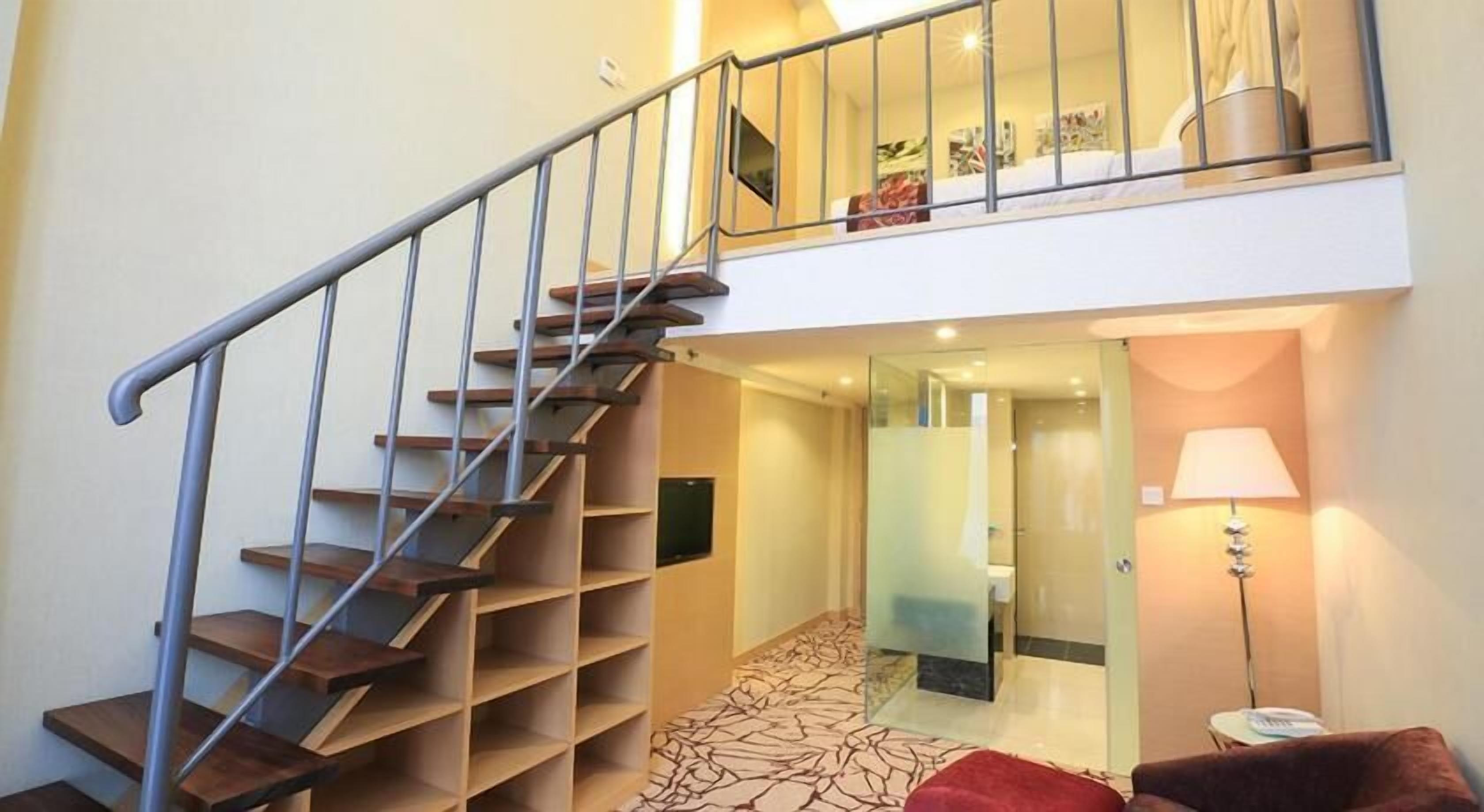 Minibar, coffres-forts dans les chambres, fer et planche à repasser