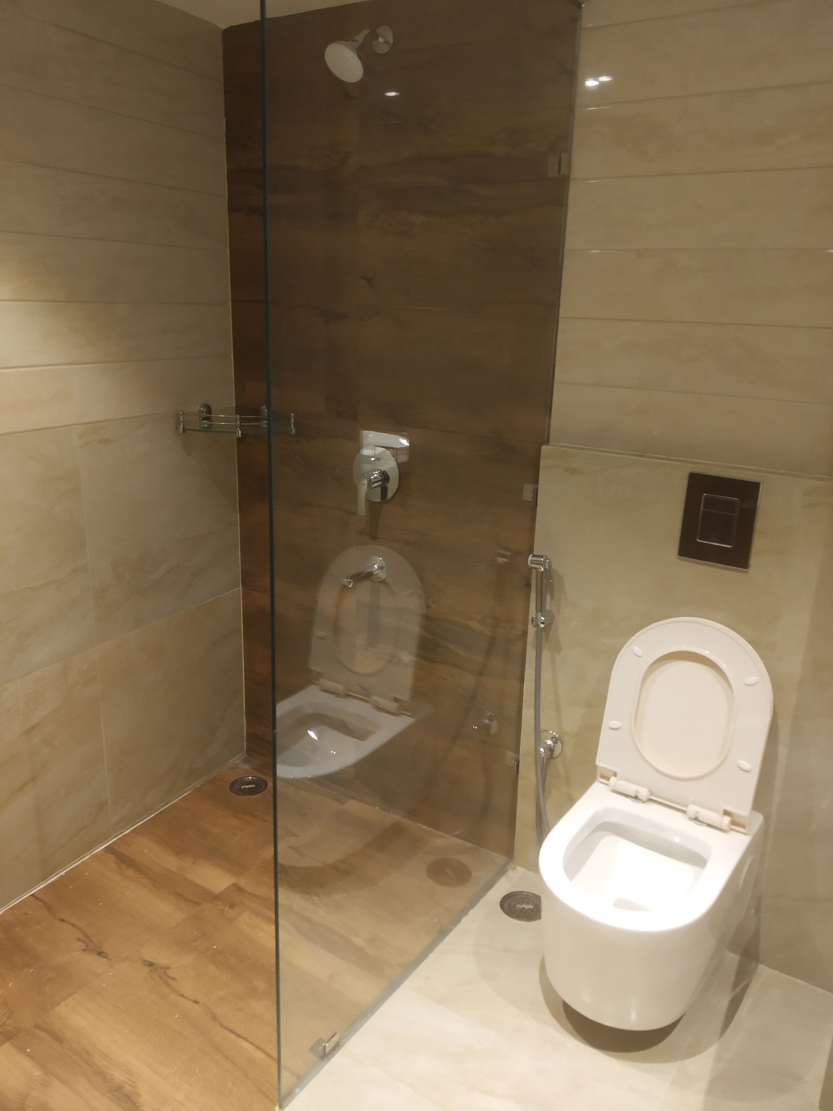 Jetted bath, designer toiletries, hair dryer, bathrobes
