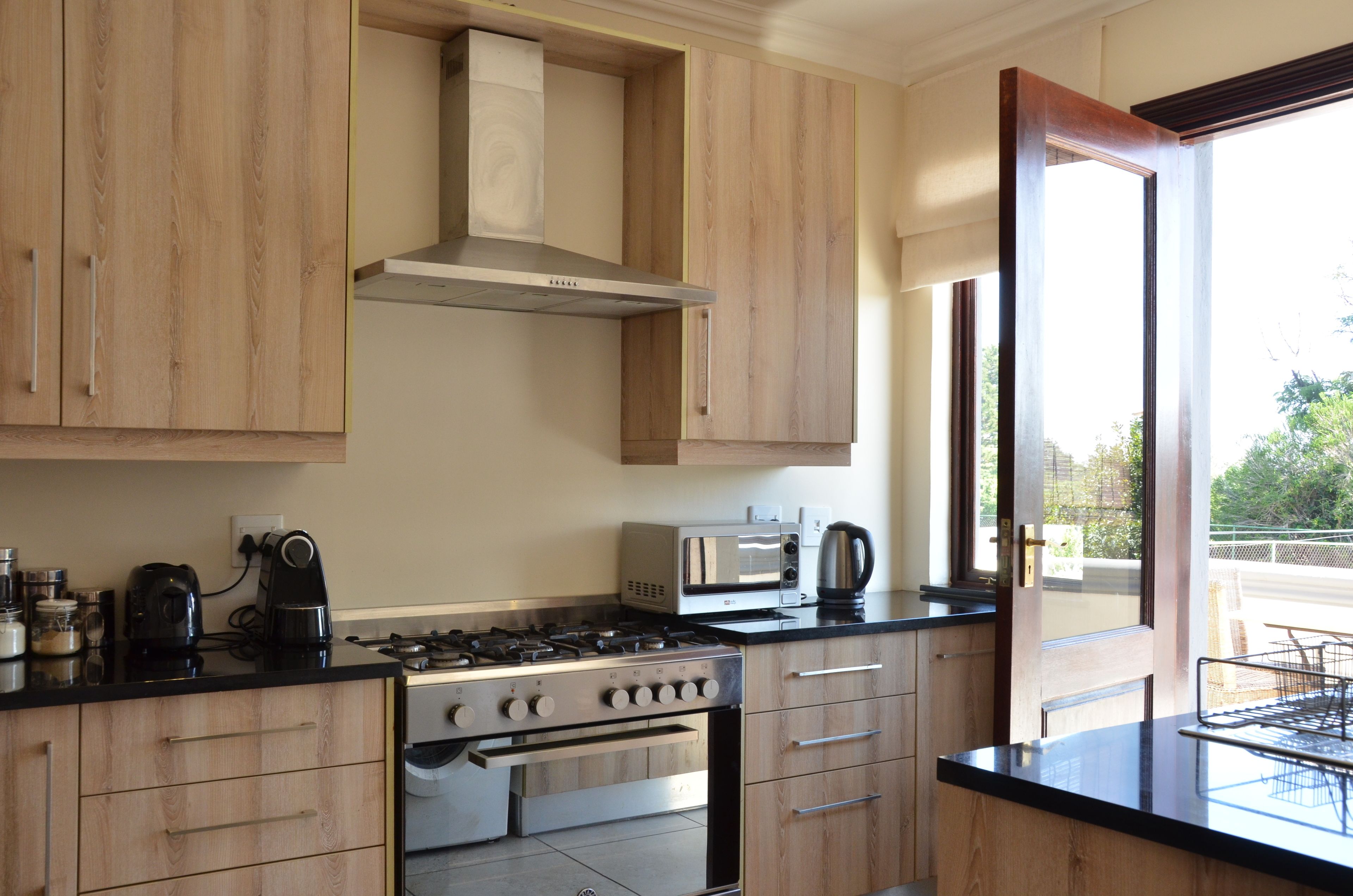 executive suite, 2 bedrooms, garden view | private kitchen | fridge, espresso maker, coffee/tea maker, electric kettle