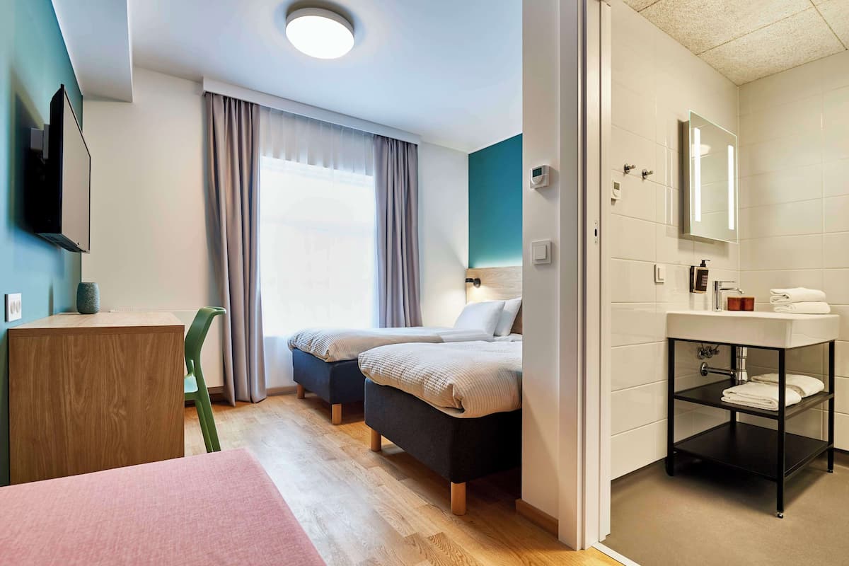 economy room, 2 single beds, non smoking | desk, blackout curtains, free wifi, bed sheets