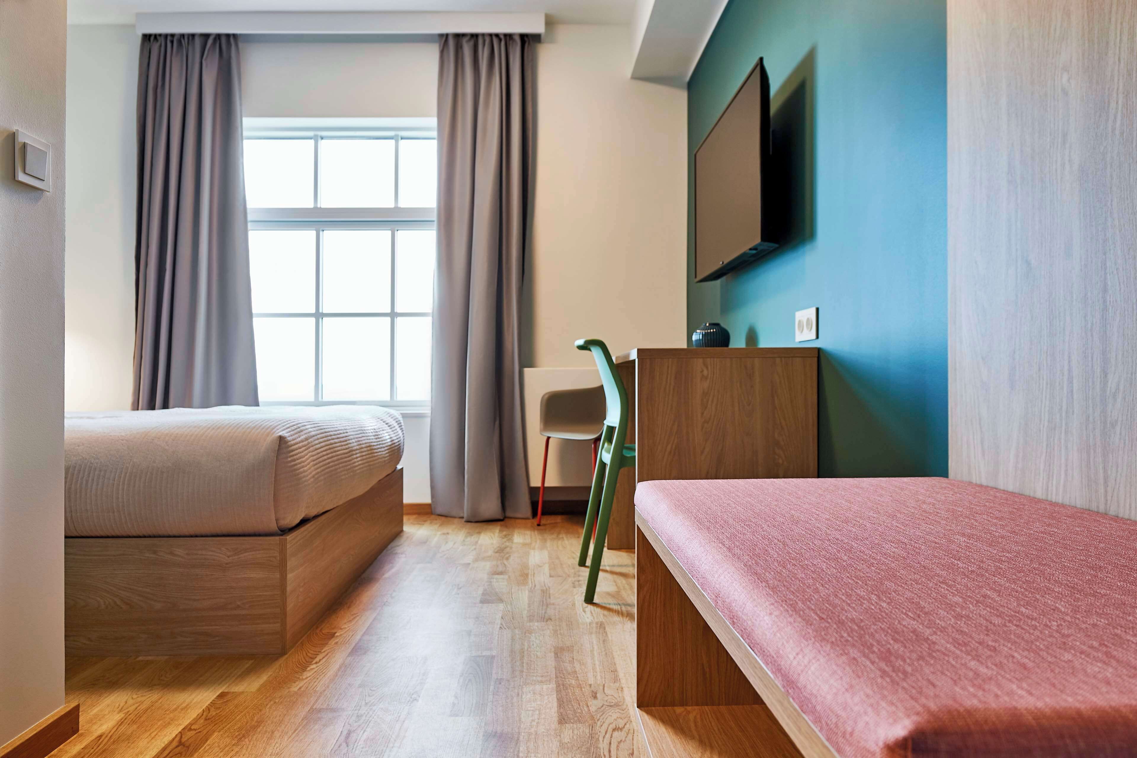 desk, blackout curtains, free wifi, bed sheets