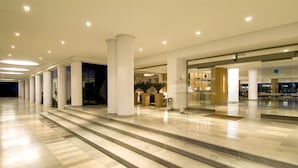 A spacious lobby with a marble floor, large columns, and a well-lit ceiling. - Thalassa Sousse Resort & Aquapark (Sousse)