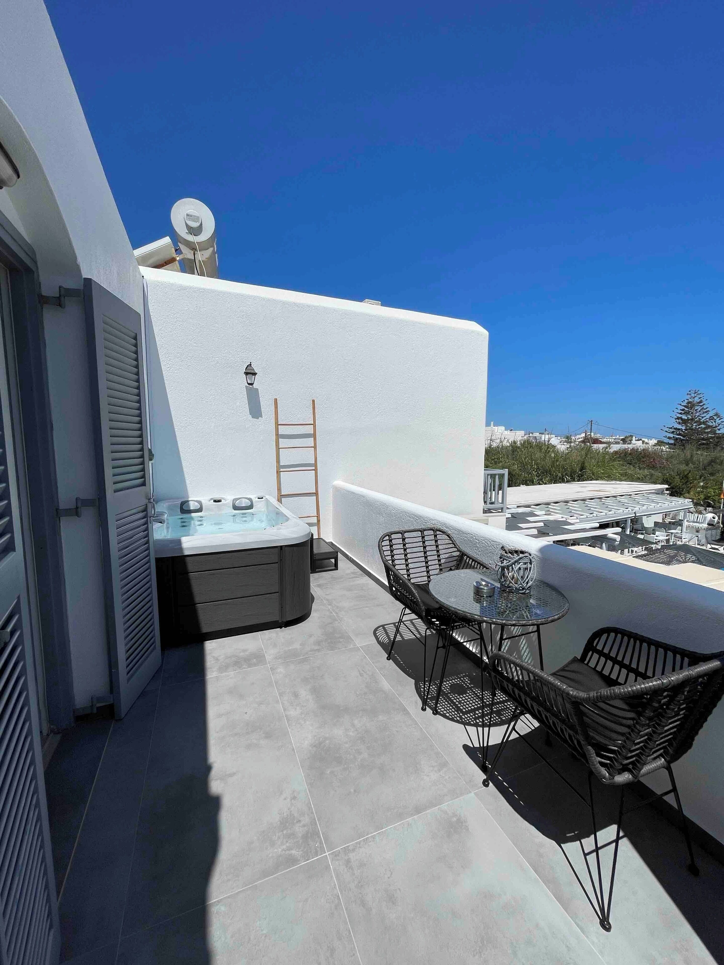 Lyxig studiosvit - 1 kingsize-säng - bubbelpool - havsutsikt | Terrass/Patio