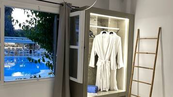 Family Suite, 2 Bedrooms, Hot Tub, Pool View | Minibar, in-room safe, individually decorated, individually furnished