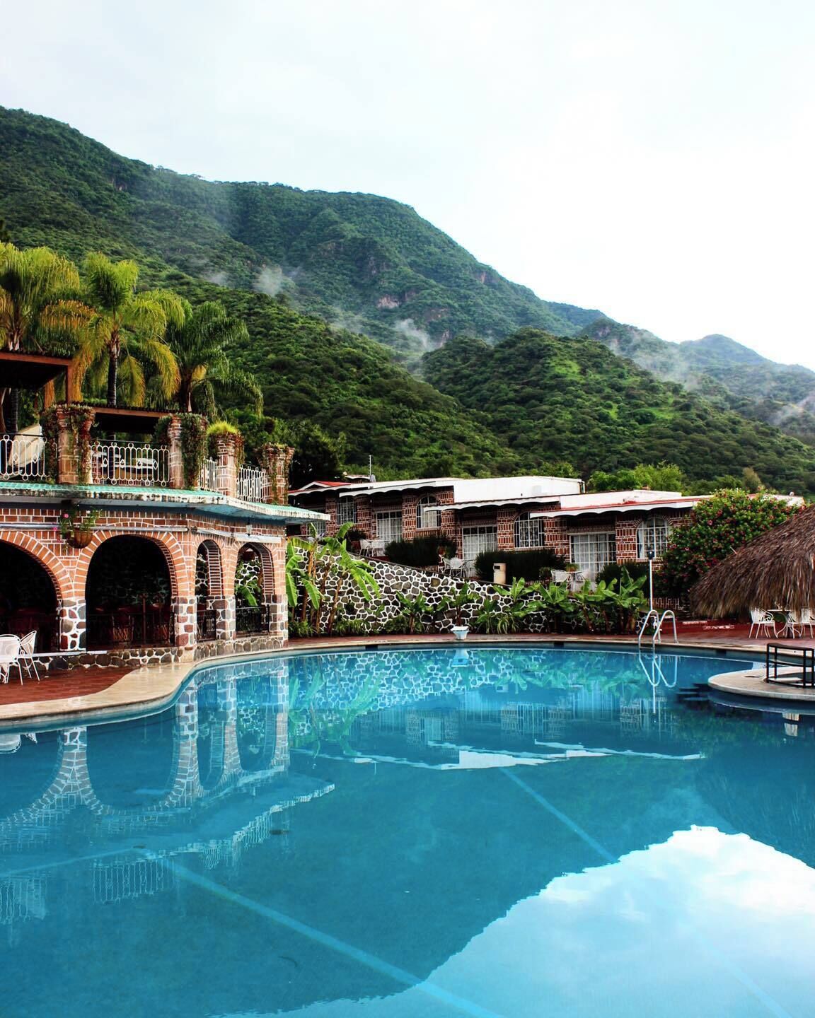 Outdoor pool, pool umbrellas, pool loungers