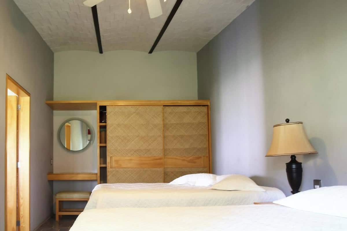 Deluxe Room, Kitchen, Lake View | 2 bedrooms, premium bedding, individually decorated, iron/ironing board