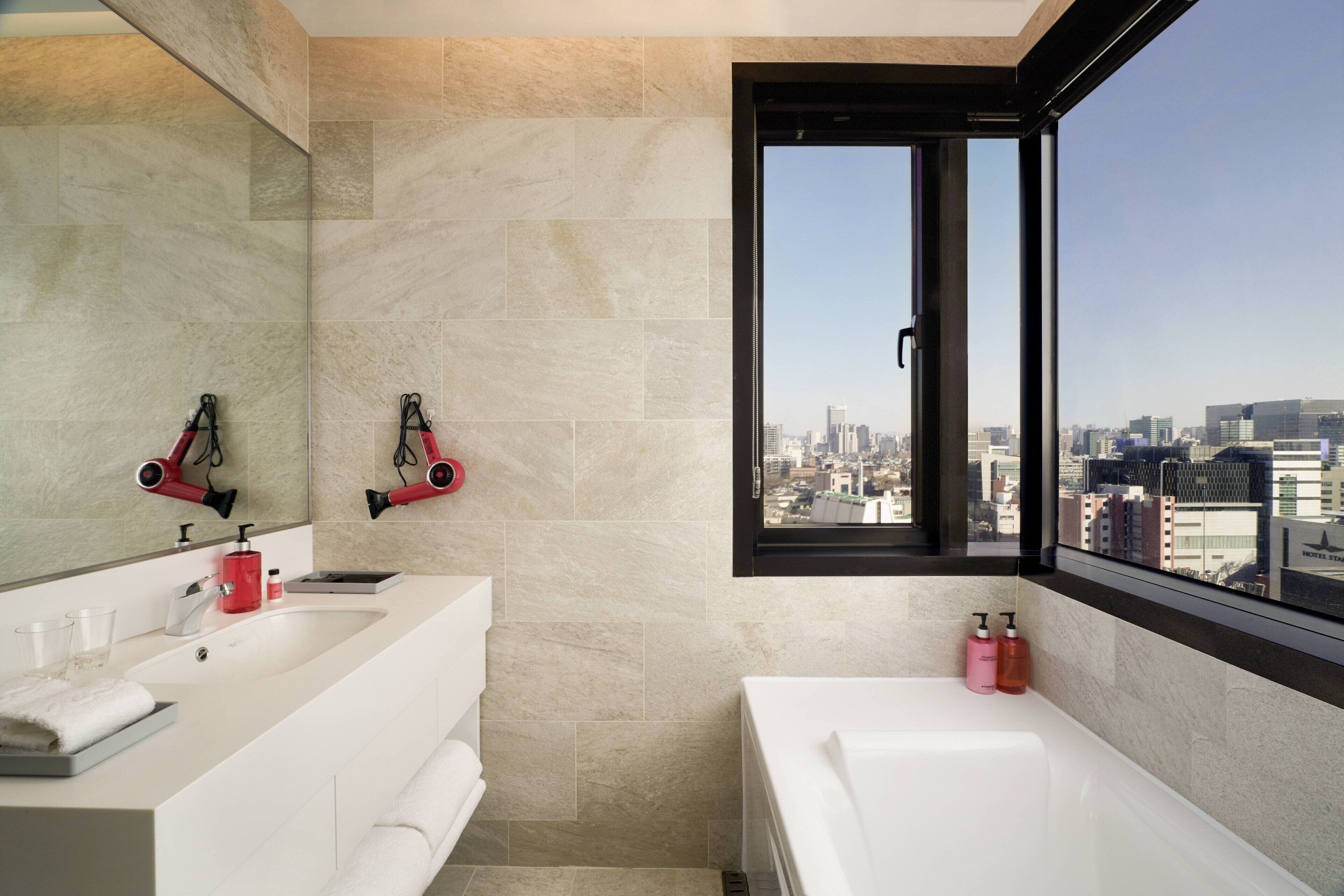 shower, hair dryer, bathrobes, slippers