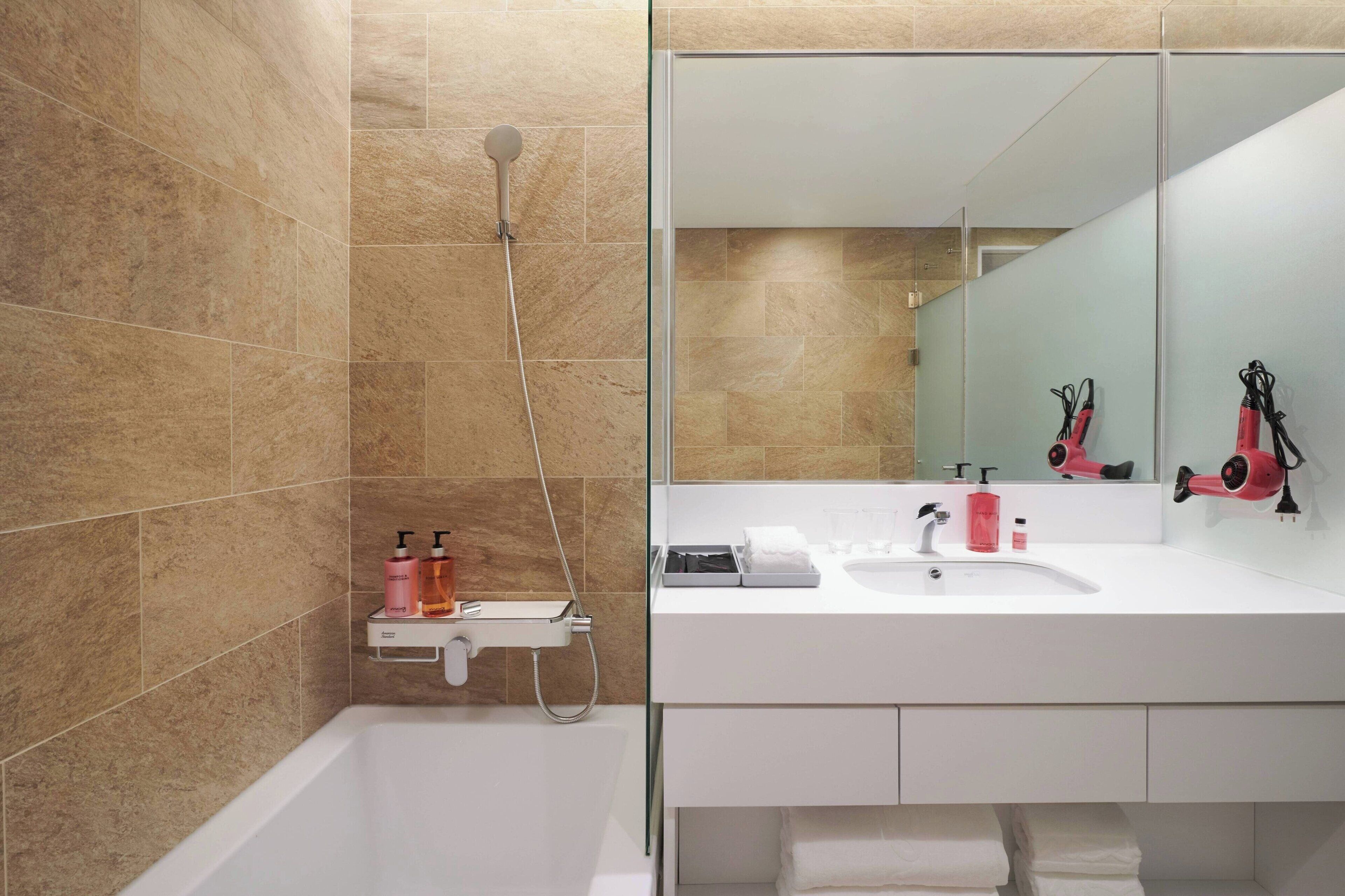 shower, hair dryer, bathrobes, slippers