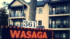 A digital sign for Wasaga Riverdocks Hotelsuites with the number 361. - Wasaga Riverdocks Hotel Suites (Wasaga Beach)
