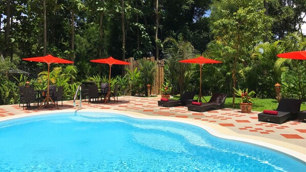 Outdoor pool, open 9:00 AM to 10:00 PM, pool umbrellas, pool loungers