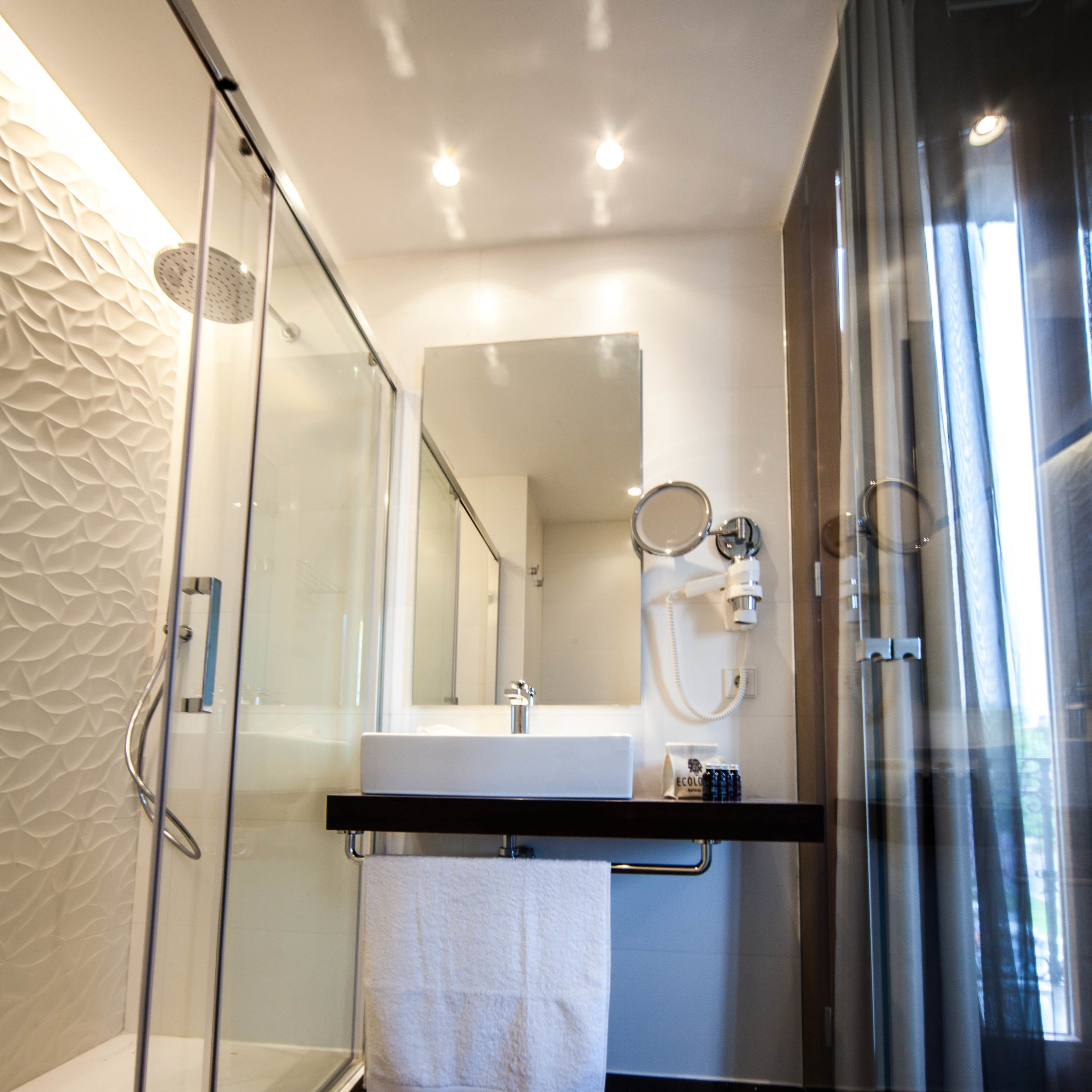 shower, rainfall showerhead, designer toiletries, hair dryer