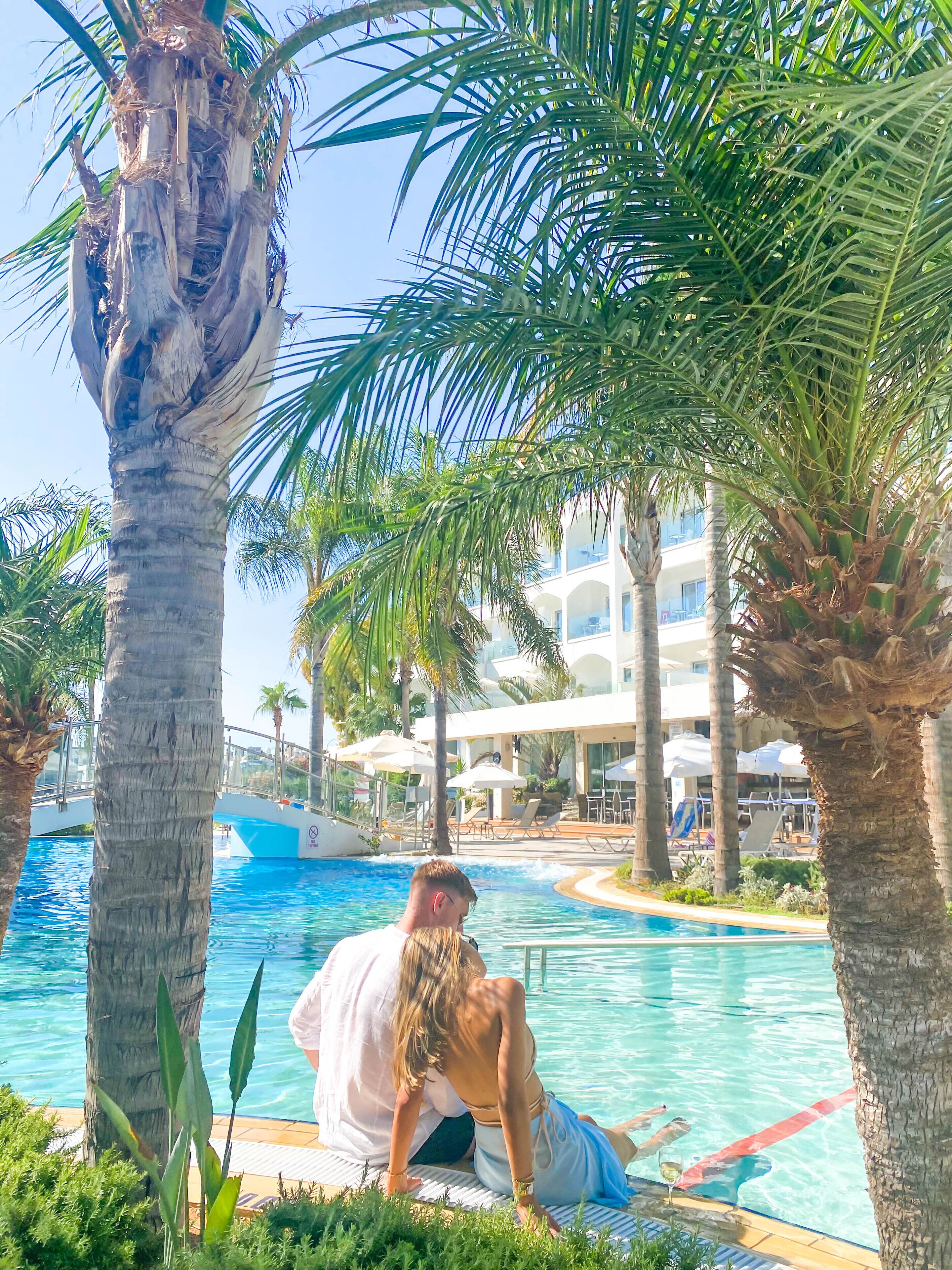 outdoor pool, pool umbrellas, pool loungers