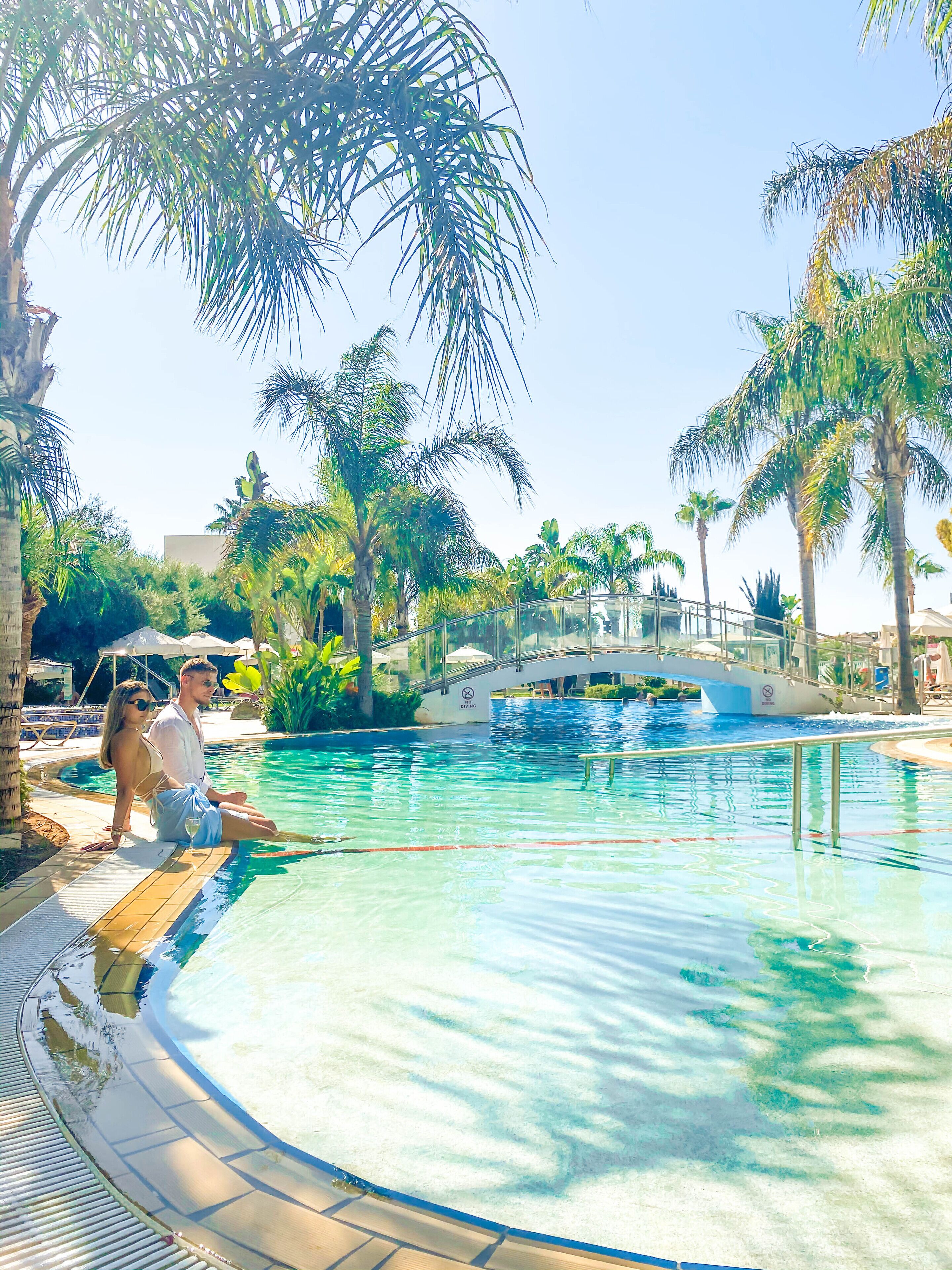 outdoor pool, pool umbrellas, pool loungers