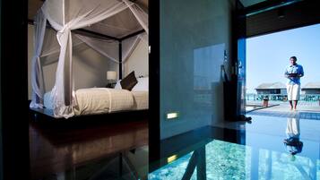 Deluxe Water Villa | Free minibar, in-room safe, desk, laptop workspace