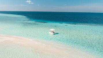 Private beach, white sand, free beach cabanas, sun-loungers