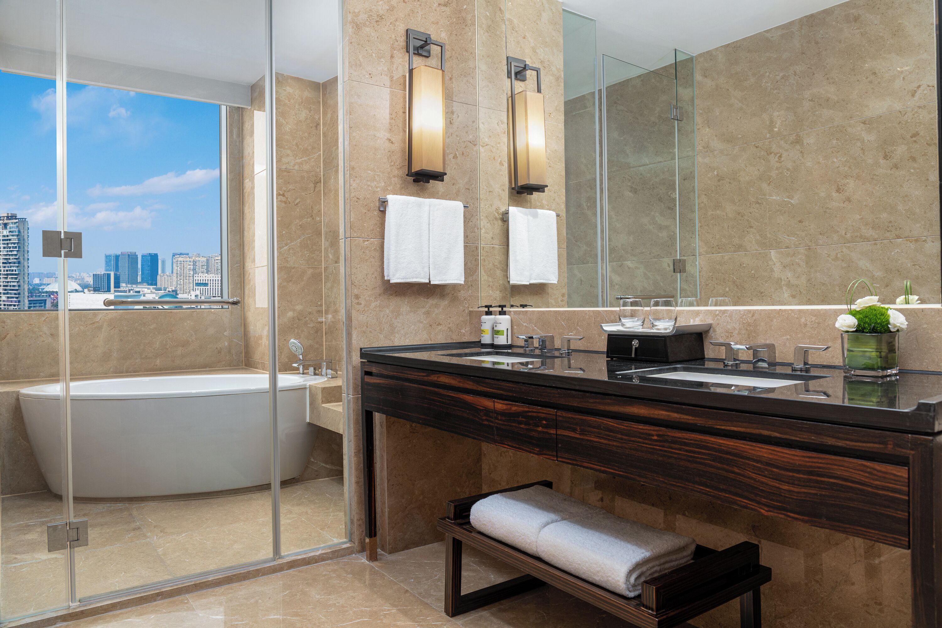 deluxe suite, 1 king bed | bathroom | separate bathtub and shower, free toiletries, hair dryer, slippers