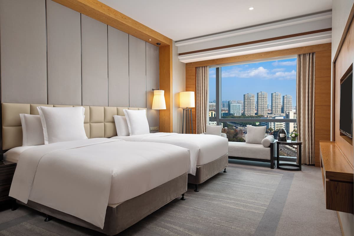 Premium bedding, memory-foam beds, in-room safe, desk