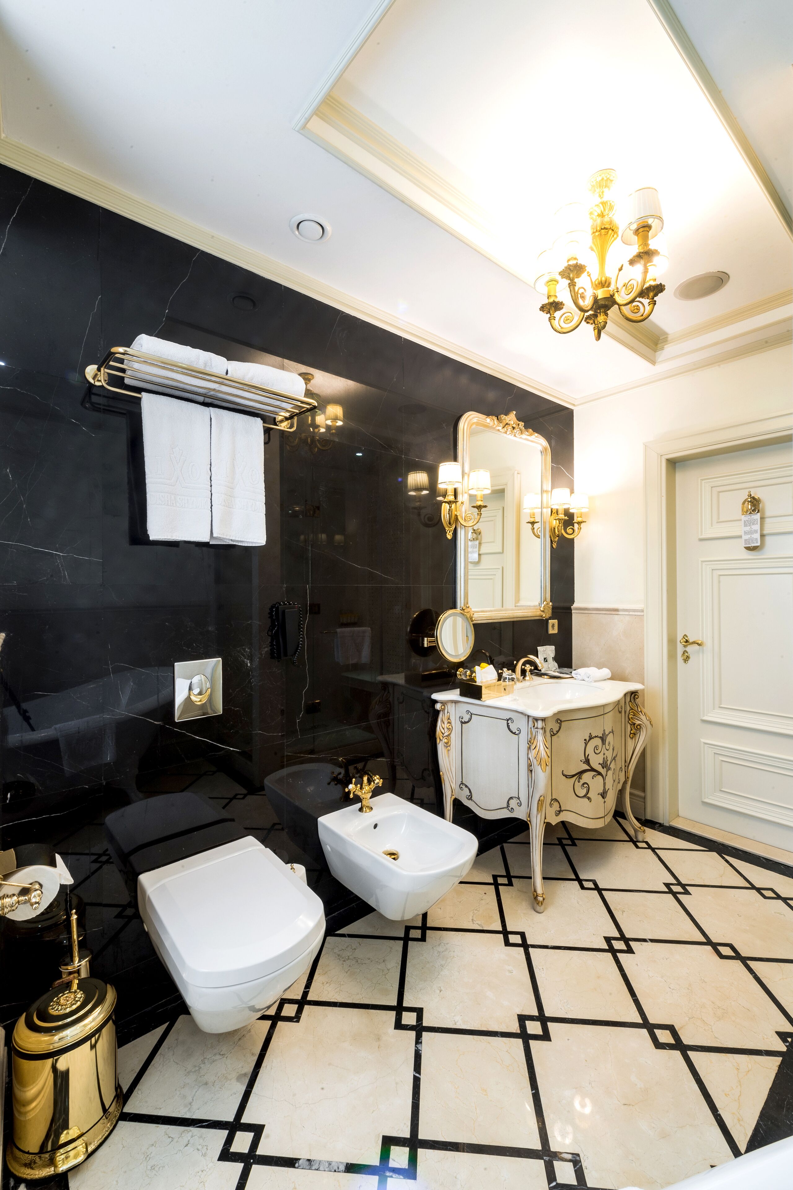 family suite, 2 bedrooms | bathroom | rainfall showerhead, designer toiletries, hair dryer, bathrobes