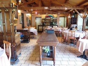 Lunch, dinner served; local cuisine, garden views