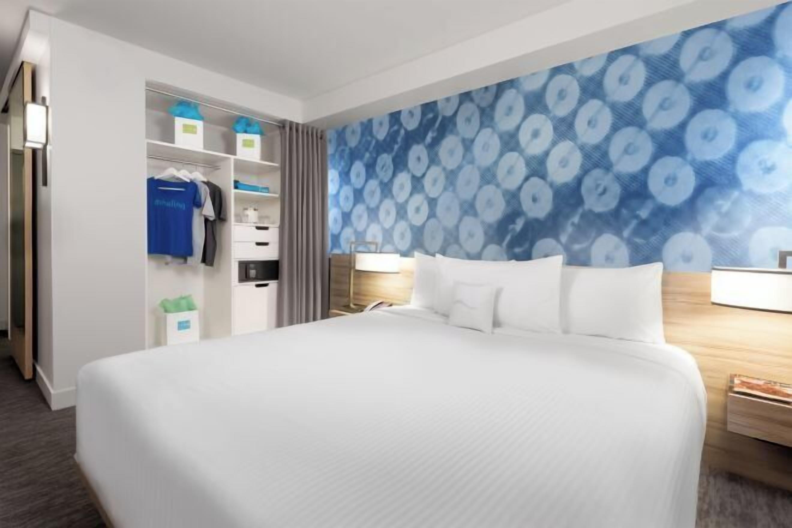Down duvets, pillow-top beds, in-room safe, desk