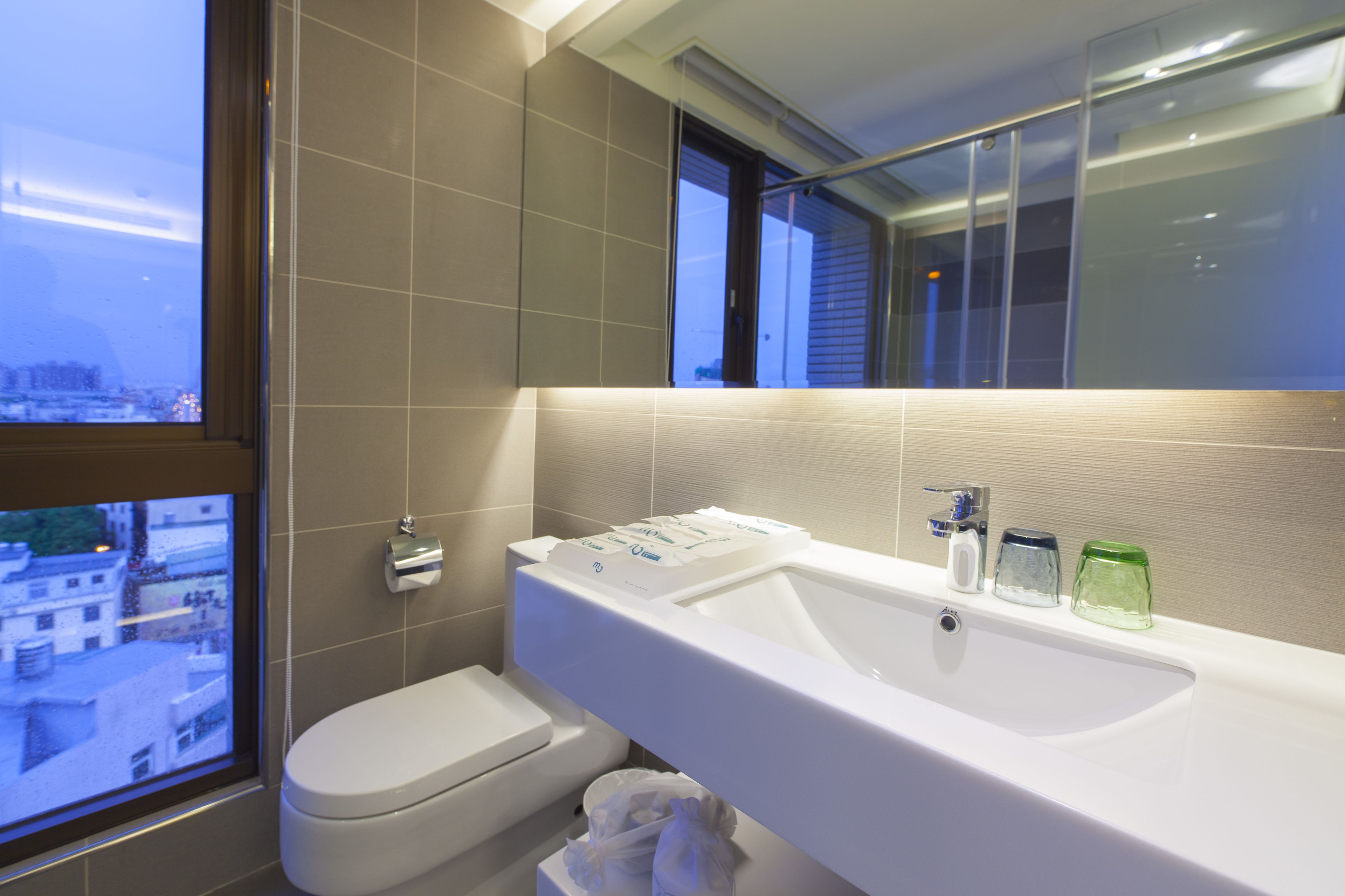deluxe room | bathroom | free toiletries, hair dryer, slippers, electronic bidet