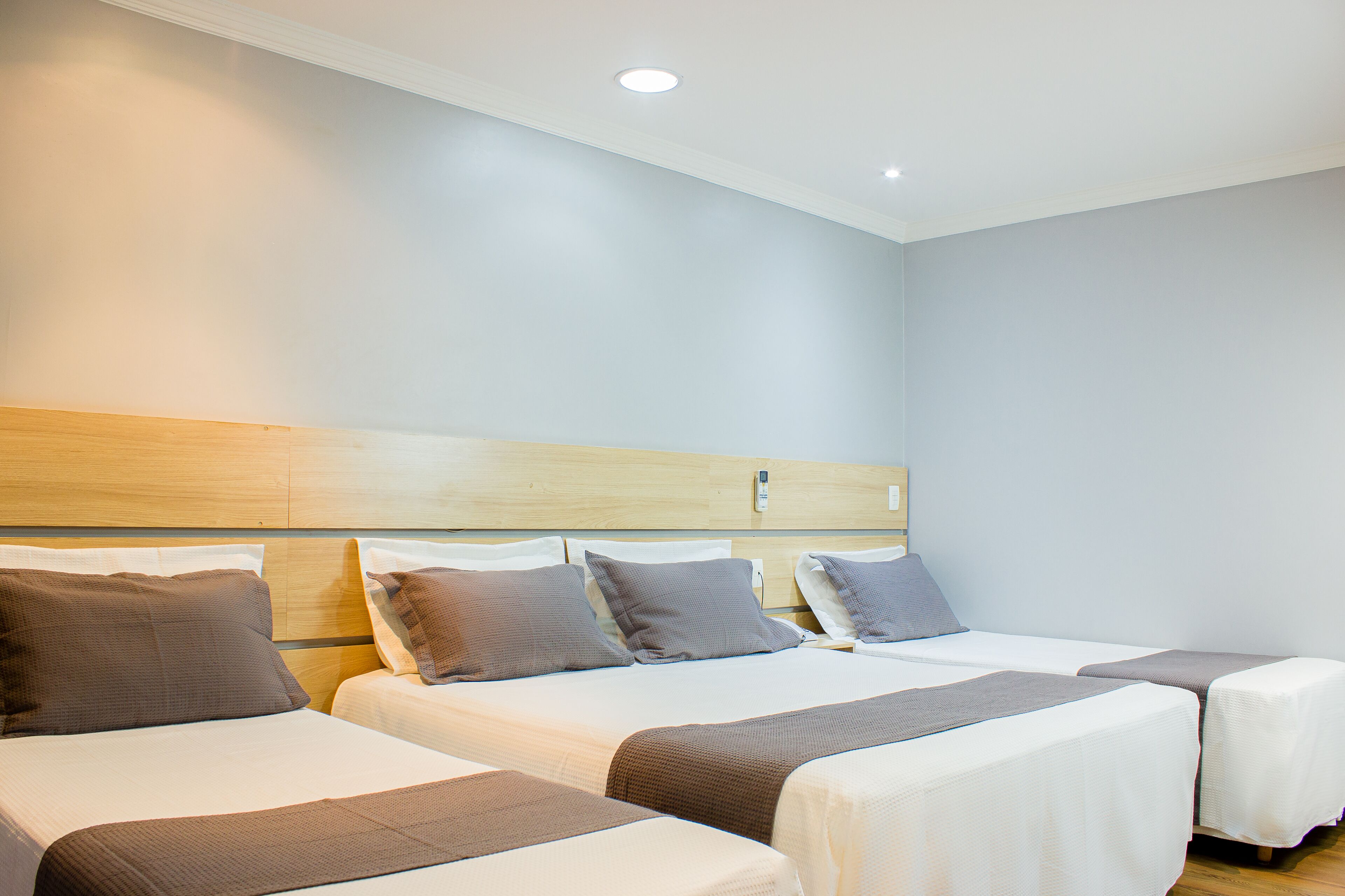 deluxe quadruple room | 1 bedroom, select comfort beds, minibar, individually decorated