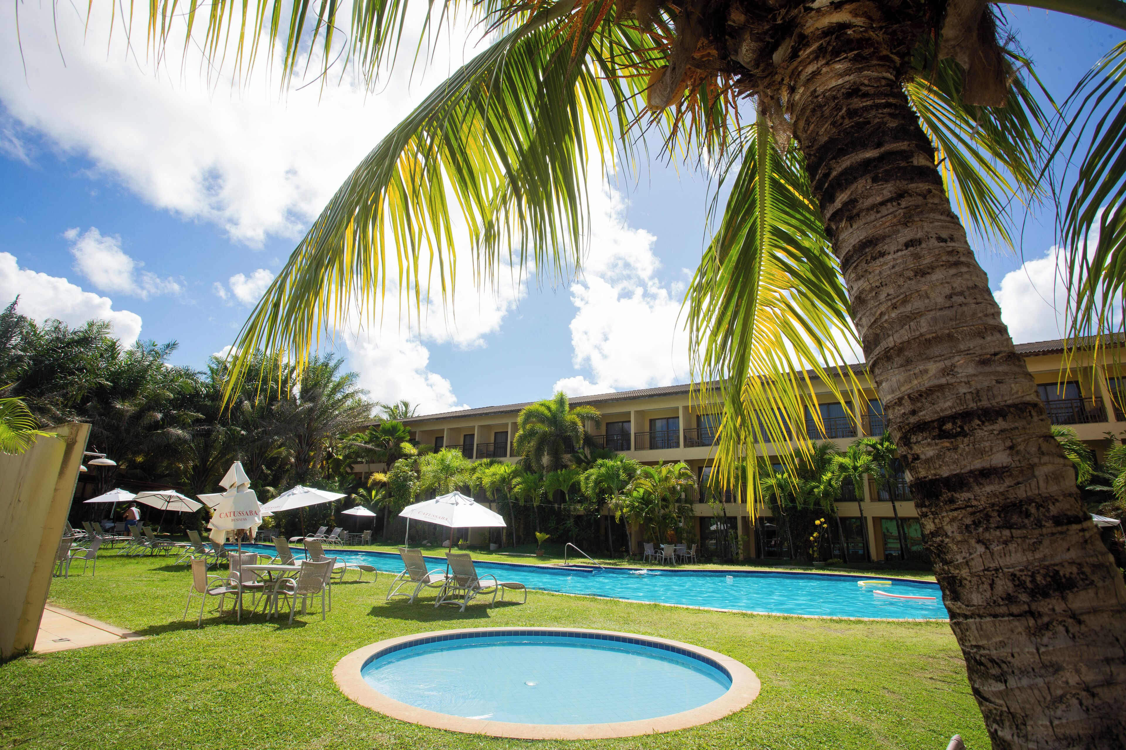 outdoor pool, pool umbrellas, pool loungers