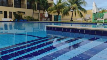 Outdoor pool, pool umbrellas, sun loungers