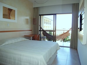 Apartamento Executivo | Coffres-forts dans les chambres, bureau, draps fournis