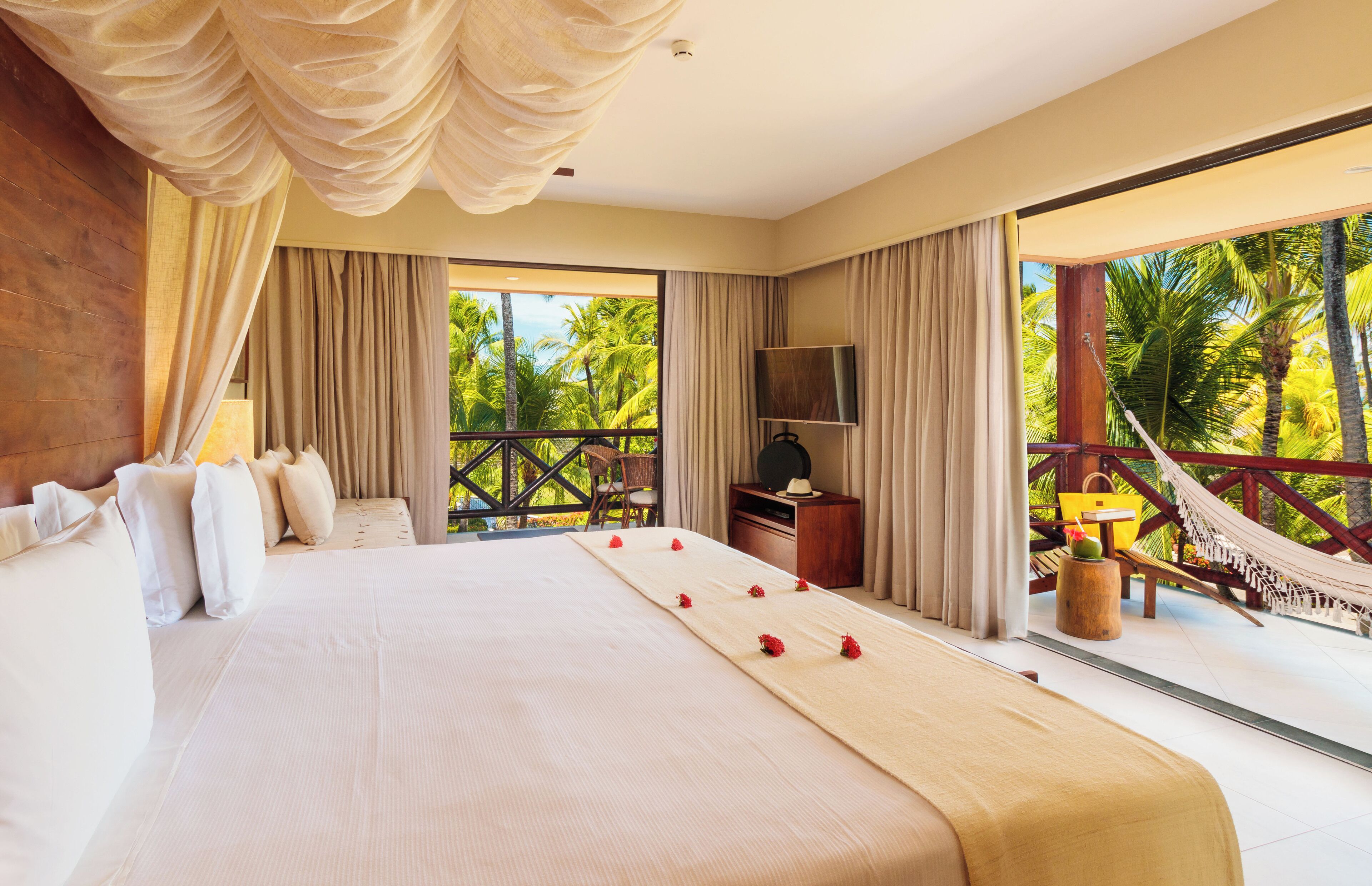 Appartamento, vista mare | Minibar, una cassaforte in camera, con stile personalizzato