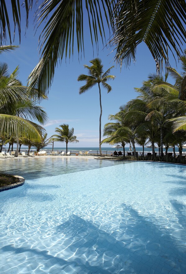 Outdoor pool, free pool cabanas, pool umbrellas