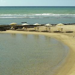 On the beach, beach umbrellas, beach towels, beach bar
