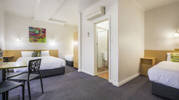 Studio Family | In-room safe, desk, laptop workspace, iron/ironing board