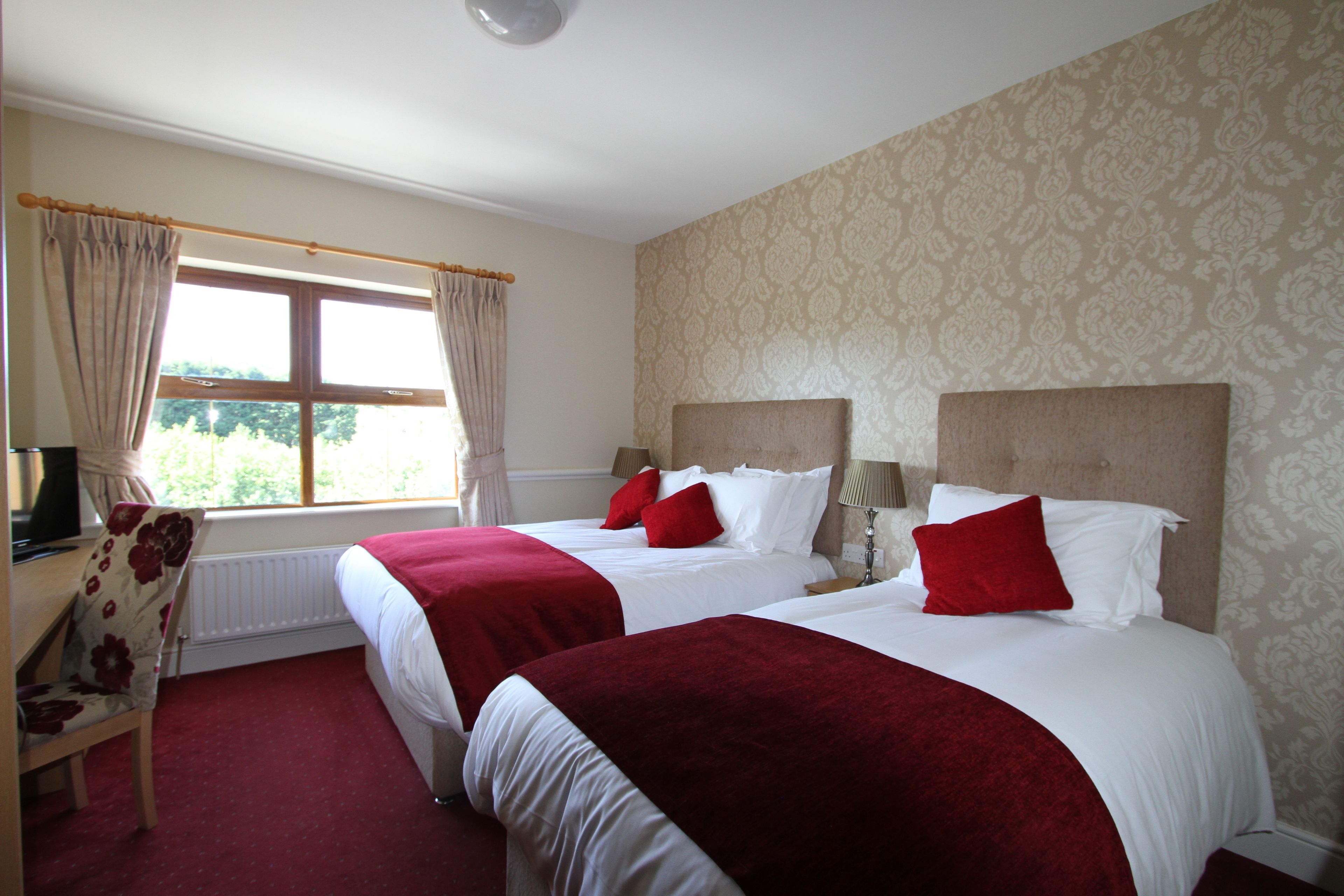 premium bedding, pillow-top beds, in-room safe, individually decorated