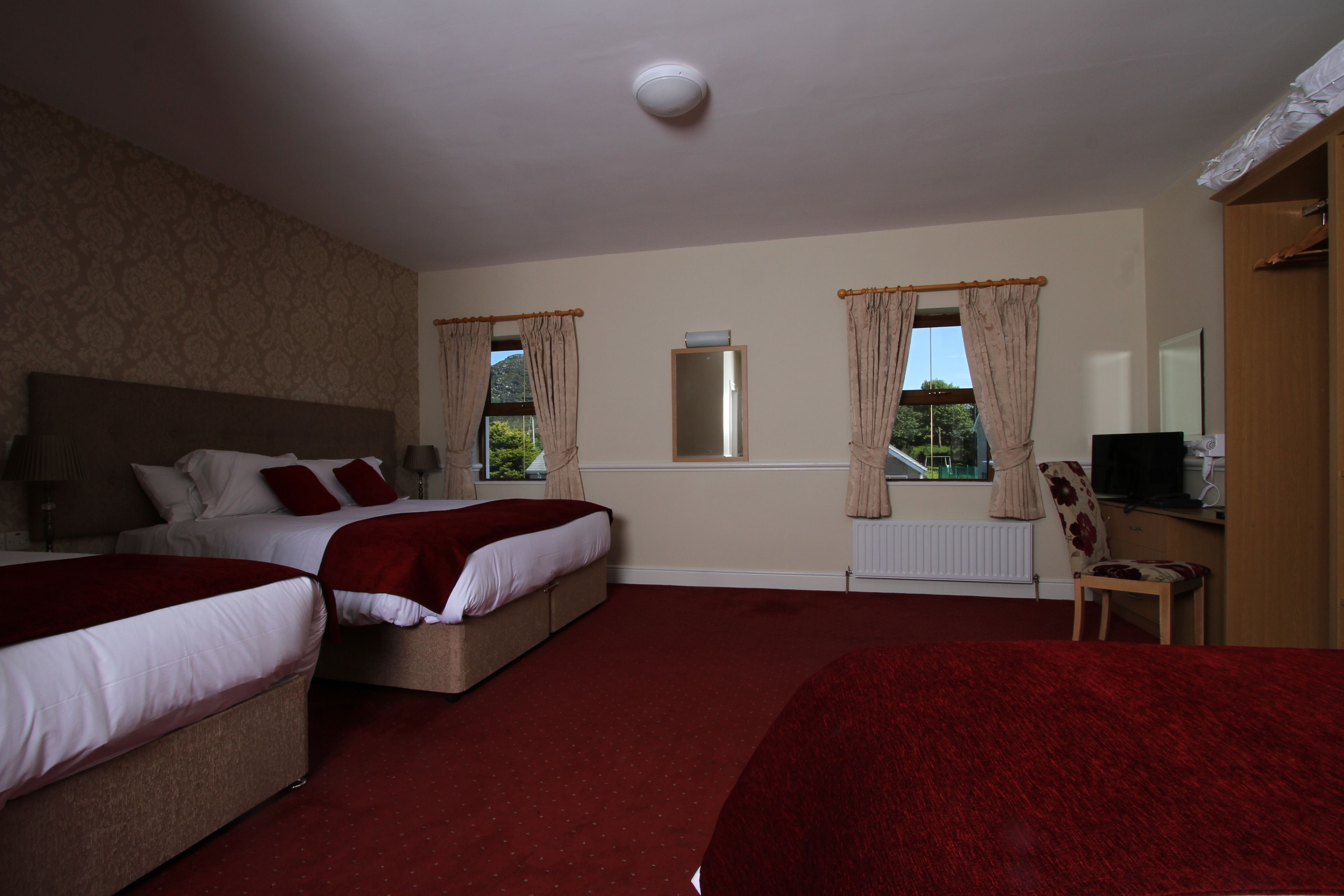 premium bedding, pillow-top beds, in-room safe, individually decorated