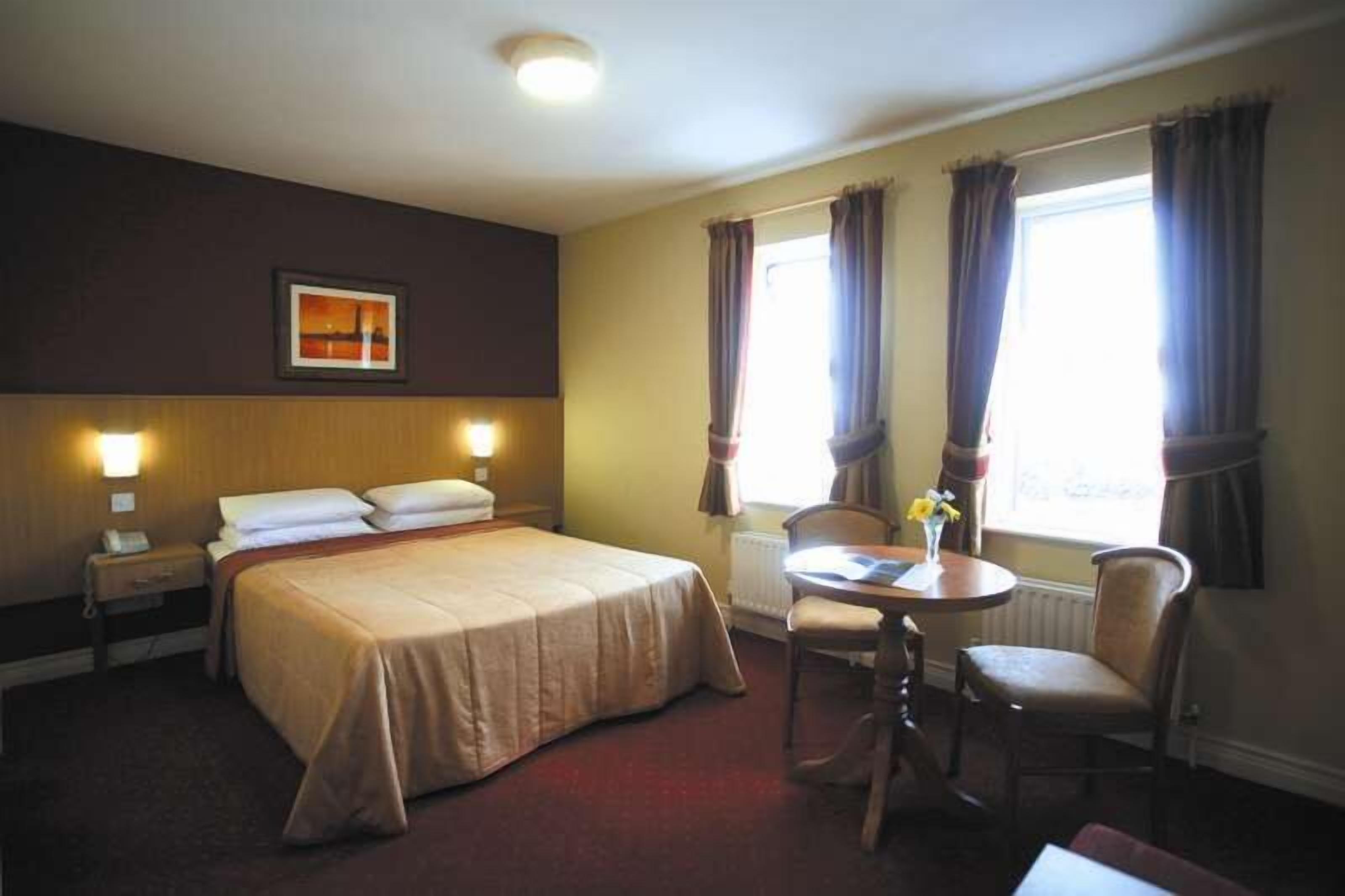 premium bedding, pillow-top beds, in-room safe, individually decorated