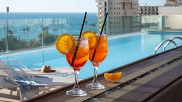 Seasonal outdoor pool, open 9:00 AM to 5:00 PM, pool loungers