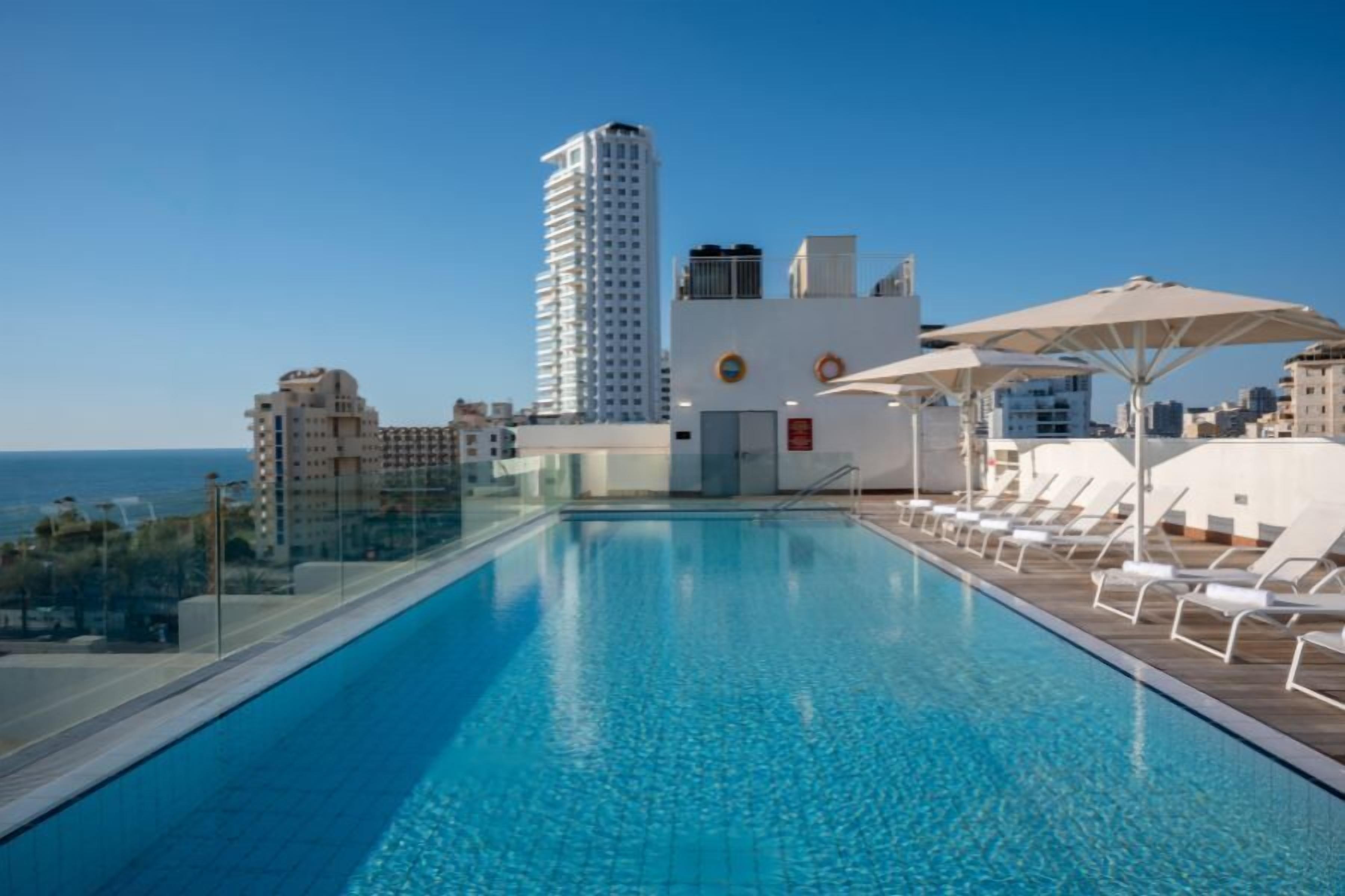 Seasonal outdoor pool, open 9:00 AM to 5:00 PM, pool loungers