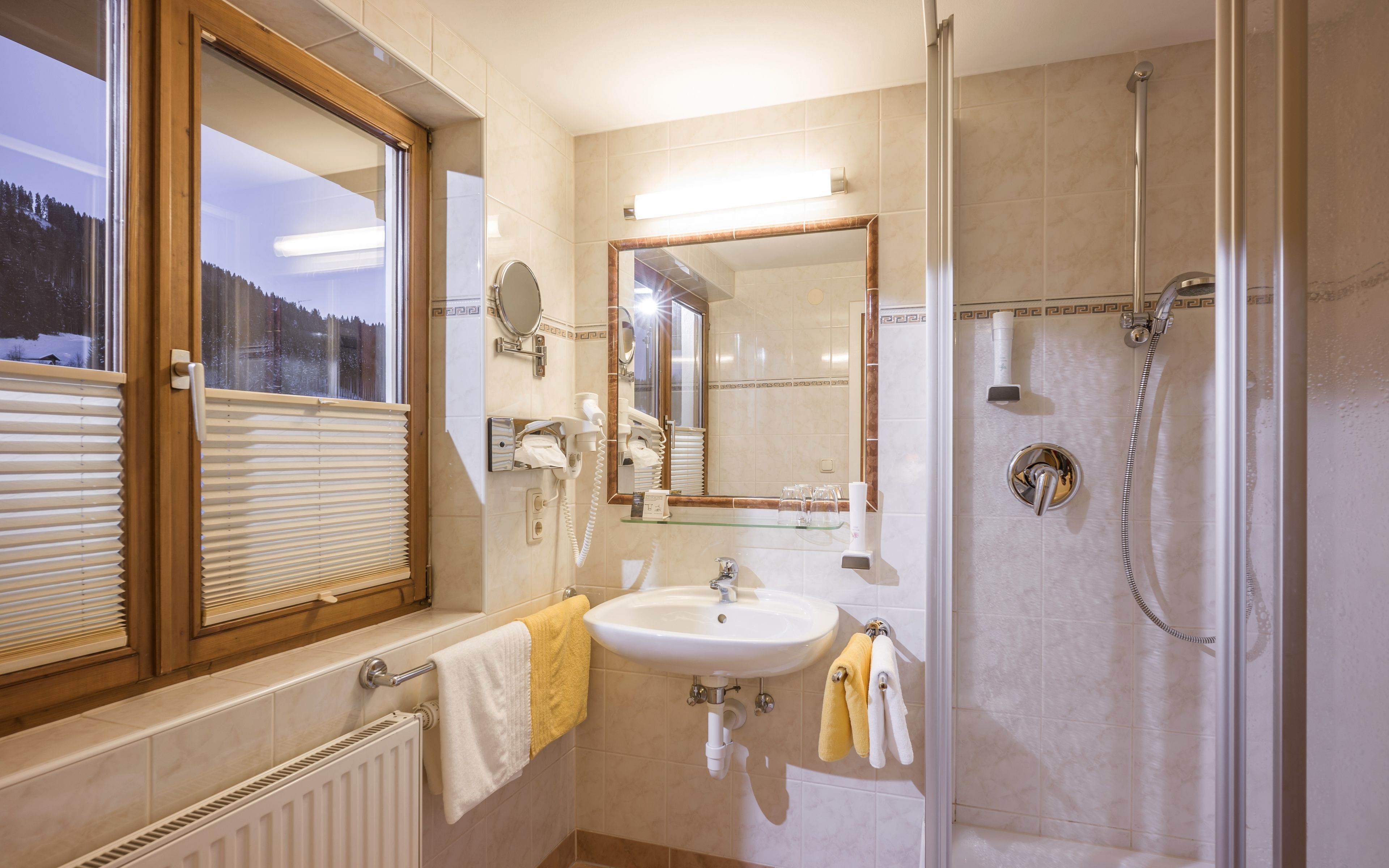 hair dryer, bathrobes, towels