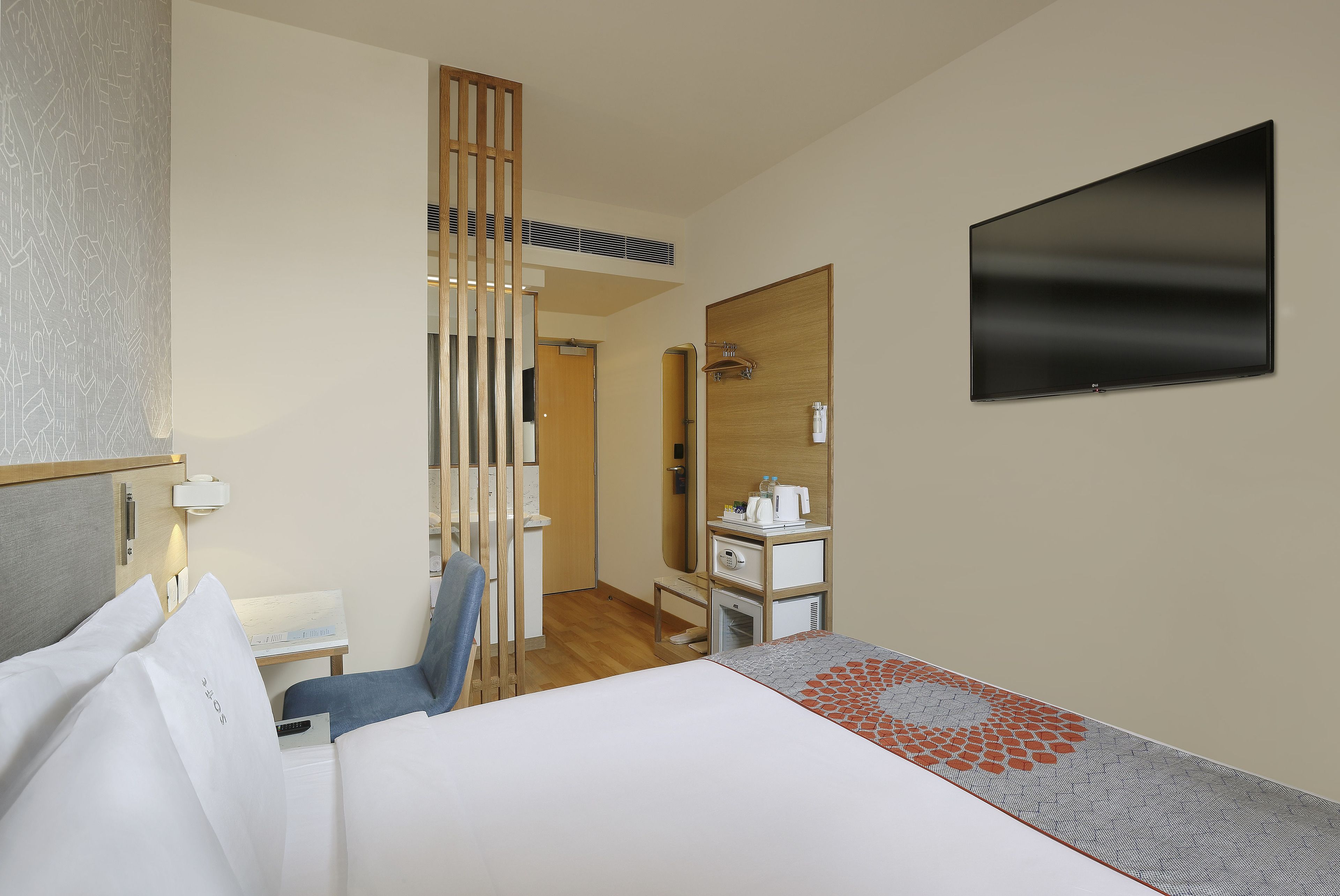 Premium bedding, minibar, blackout curtains, soundproofing