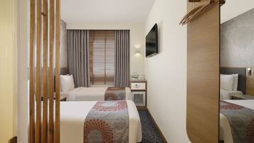 Premium bedding, minibar, blackout curtains, soundproofing