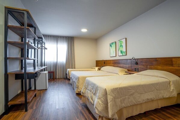 Deluxe Suite, Jetted Tub | Minibar, in-room safe, free WiFi, bed sheets